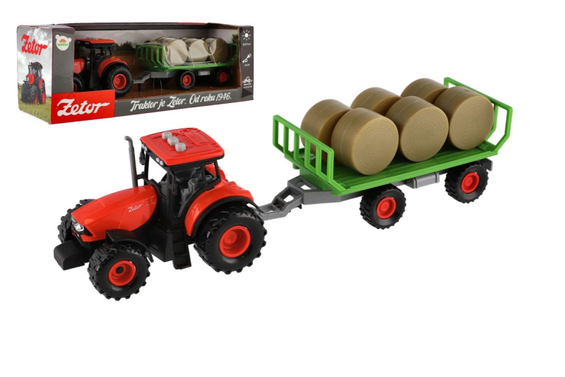 Traktor Zetor s vlekem a balíky, setrvačník